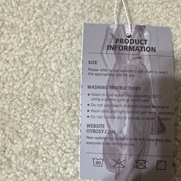 Elegant Black Mini Dress with Gold Accents - Picture 6 of 6